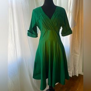 Unique Vintage brand emerald green a-line v-neck dress